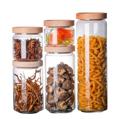 China High Keeping Freshness Borolicicate Custom 700ml 1000ml 1500ml Glass Jar With Acacia Wood Lid for sale