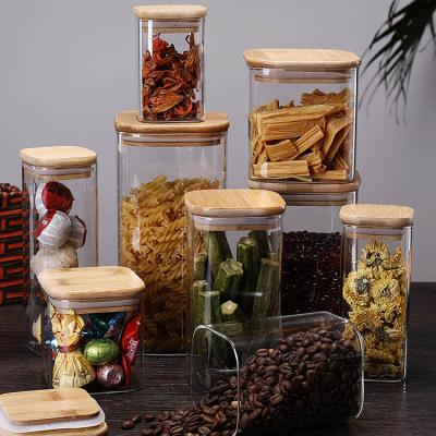 China High Freshness Retention Borosilicate Glass Airtight Storage Jar With Bamboo Lid And Silicone Ring for sale