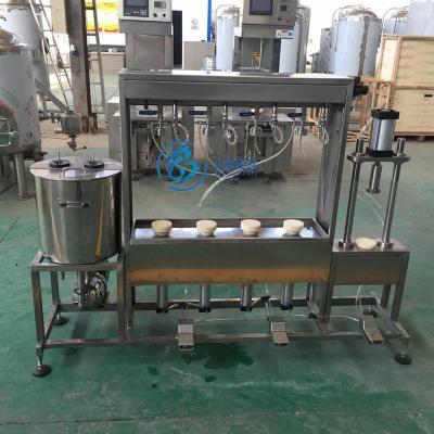 China Food Beer Filling Machine Manual Semi Automatic Glass Bottling Machine for sale