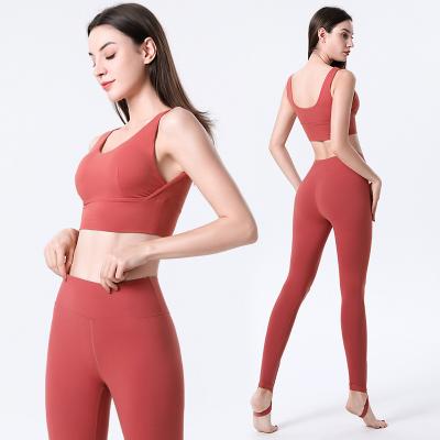 China 2022 New Women's Breathable Sports Sets Solid Yoga U-shape White Crossover Wrap Bra And Stirrup Leggings Set for sale