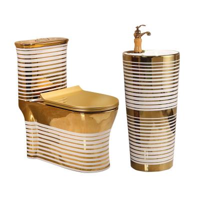 China Royal Sanitary Hidden Toilet Bowl Luxury Gold Bathroom Sink Pedestal Home Hotel Ware Cistern Style Golden Ceramic Toilet Set for sale