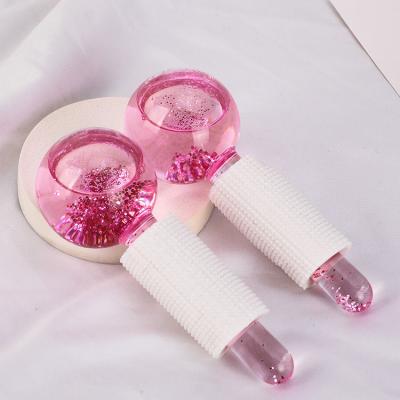 China Hot Selling Wholesale Amazon Factory Beauty Ball Glitter Blood Vessel Removal Cooling Massager Pink Ice Facial Globes For Face Lifting Tightening for sale