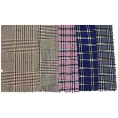 China Thousand bird plaid 100% elastic polyester weft fabrics, used for clothing, coats and pants for sale