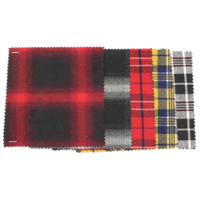 China High quality Shrink-resistant plaid 100 polyester weft knitted elastic fabric for clothing, coats and shirts for sale