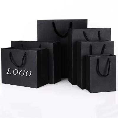 China Recyclable Wholesale Custom Printed Black Luxury Shopping Paper Gift Bag With Handle for sale