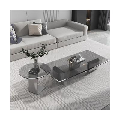 China Adjustable (other) Luxury Modern Home Living Room Dining Table Creative Glass High-end Stainless Steel tempering glass Coffee Table for sale