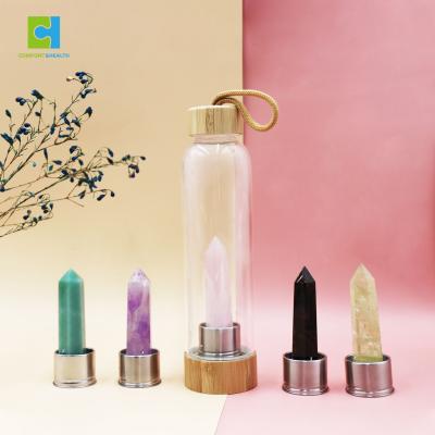 China Crystal Water Bottle Bamboo Lid Viable Glass Crystal Water Bottle with Crystal Stone Gem for sale