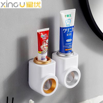 China Sustainable New Custom Wall Mounted Plastic Bathroom Hands Free Manual Toothpaste Dispenser for sale