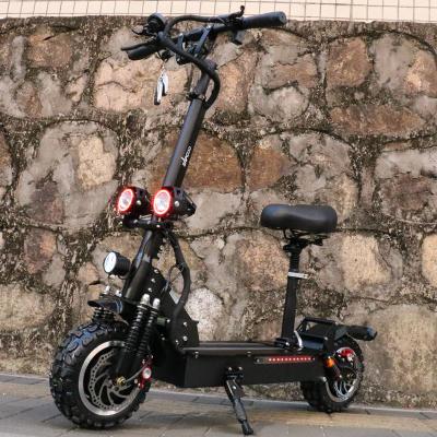 China 2021 OEM hot sale unisex trend 60v 6000W 11 inch wheel electric scooter fast electric scooter for adult for sale