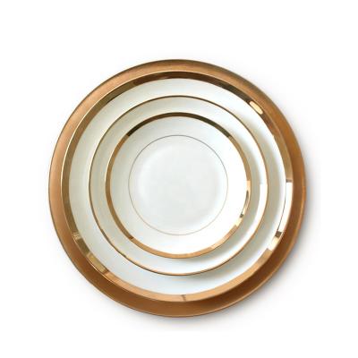 China Sustainable High End Luxury Porcelain Gold Wide Rim Ceramic Dinnerware High Hard Dinner Sets for sale