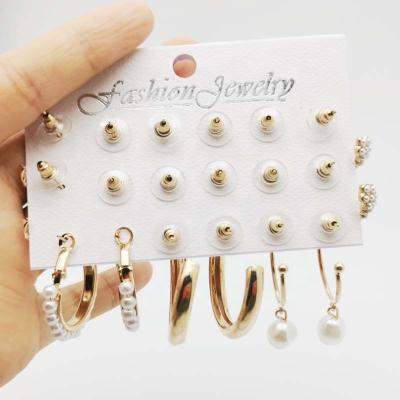 China Autumn And Winter Pearl Earrings FASHIONABLE 9 pairs placed European and American metal border earrings exaggerated c-shaped personality for sale