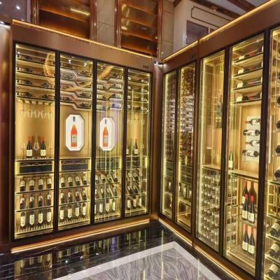 China Display de lujo de temperatura constante gabinete partición de acero inoxidable metal gabinete de vino con puerta de cristal para el club en venta