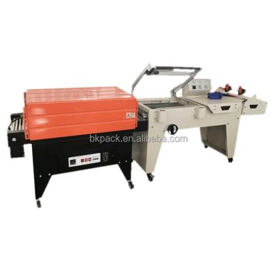 China Manual L Film Bar Sealer Heat Shrink Tunnel Wrapping Machine Shrink Wrapping Food Food Pof Machine With Cheap Price for sale