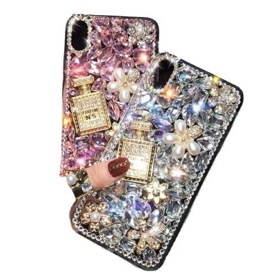 China 2022 Luxury Waterproof Phone Case Planner Trending Products Shape TPU Anti-drop Phone XR 13 12 Pro Perfume Bottle Rhinestone Phone Case for sale