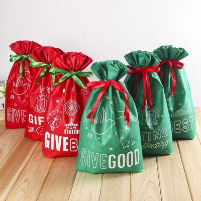 China Drawstring Bag Drawstring Bag, Christmas Gift Bag, Eco Friendly Christmas Sack Cartoon Printed Nonwoven Christmas Stocking 1 Color for sale