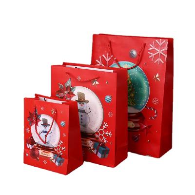 China Recyclable Christmas Party Supplies Recyclable Candy Gift Favor Paper Bags Party Treat Wrapping Gift Bags For Shopping Tissue for sale