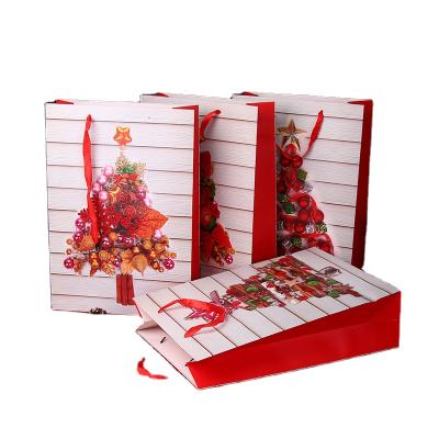 China Recyclable Custom Biodegradable Paper Custom Candle Printing Christmas Gift Packaging Paper Shopping Bag for sale