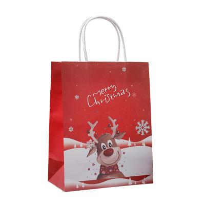 China Low MOQ Recyclable Christmas Gift Bags Paper Shopping Bag With Handle for sale