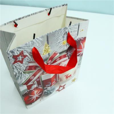 China Cheap And High Quality Recyclable Paper Shopping Bag Factory Custom Printed Shopping Paper Bag With Logo for sale