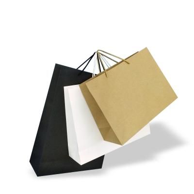 China Luxury a4 brown shopping paper custom craft paper cheap white black recyclable kraft paper bag wholesale with logo for sale