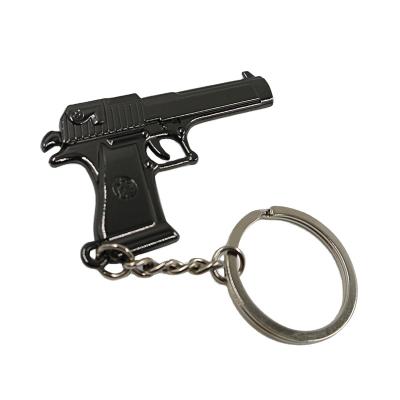 China Mini gun metal alloy winter Mexico metal weapon shape keychains bullet key chain for sale