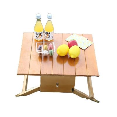 China Outdoor wooden multi-functional stall table pine camping table Europe small folding family table portable picnic BBQ for sale