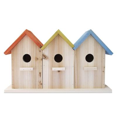 China Viable Indoors Custom Design 3 Holes Indoor Decorative Handmade Wooden Bird House Kit for sale