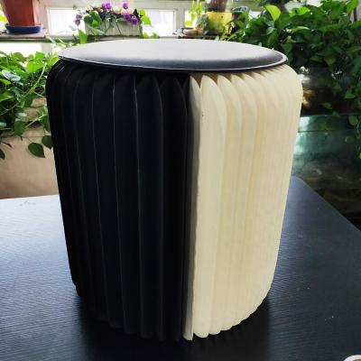 China Fancy White And Black Portable Shoes Foldable Paper Folding Stools Changing Stools Small for sale