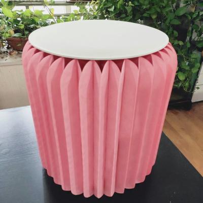 China Small round color fashion color paper folding stools honeycomb pink portable foldable paper furniture changing stools for sale