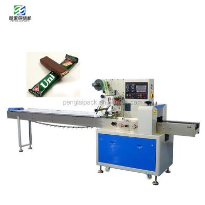 China Commercial horizontal beverage/chocolate/cookie pillow bag packaging machine/biscuits sit packing machine for sale