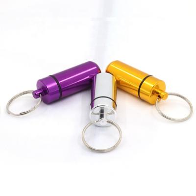 China Gifts Pill Box Key Chain Checked Material 7 Pcs Manufacturer Wholesale Aluminum Waterproof Empty Pill Box Key Chain for sale