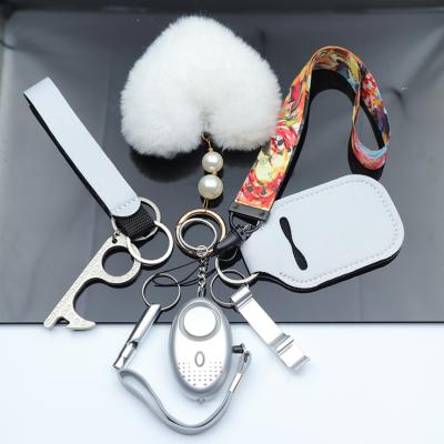 China Wholesale Customizable Long Spike Self Defense Plastic Checked Self Defense Manufacturer Color Key Chain Key Chain for sale