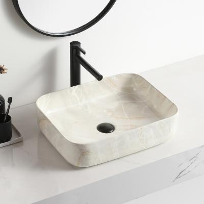 China New Pattern Unique Marble Decorated Lavamanos Basin Single Basin Easy Clean Beige Ceramic Sink Vanity Rack Bathroom for sale