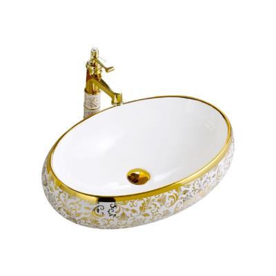 China Easy To Clean Wastafel Kamar Mandi Gold Luxury Hotel Vanity Basin Art Wash Basin Countertop Vessel Ceramic Sink for sale