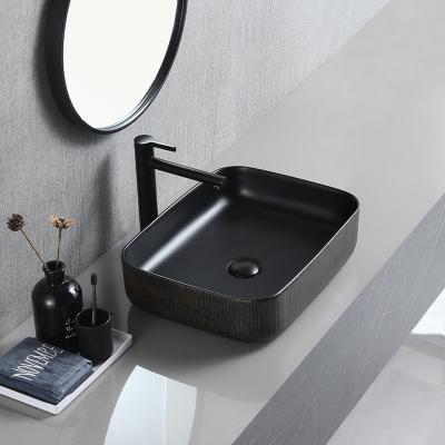 China Fancy Matte Black Lavabo Lavabo Lavabo Lavabo Bathroom Table Top Handmade Elegant Clean Porcelain Basin Sink for sale