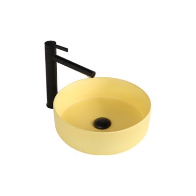 China Easy To Clean Outdoor Wash Basin Table Top Bathroom Sink Matte Yellow Ceramic Round Sink Cabinet Wash Hand Basin for sale