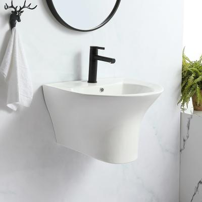 China Easy To Clean Hotel Modern Design Bathroom White Wall Hung Ceramic Toilet Sink Washroom One Piece Pedestal Sink for sale