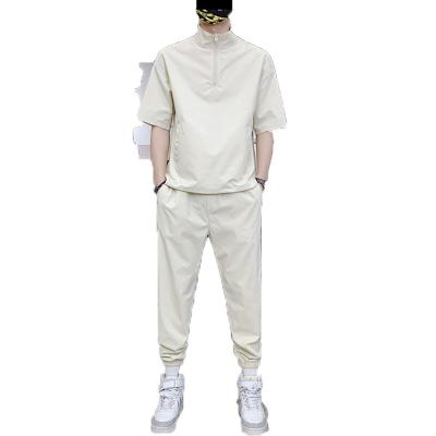 China Breathable fabrication custom design oversized casual wear short sleeve zipper pullover and sweatsuit pants men for sale