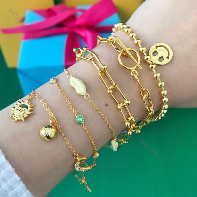 China Dylam Fashion 18k Gold Plated Bangle Women Jewelry Sun Moon Enamel Eye Smile 925 Silver Charm Fast Shipping Luxury Bracelets for sale