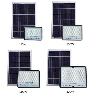 China Smart high quality waterproof outdoor lighting ip65 ABS smd 50w 100w 150w led solar flood light for sale