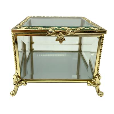 China Luxury Glass Gift Trinket Gold Jewelry Display Organize Box With Metal Frame for sale