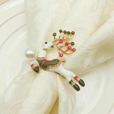 China High Quality Gold Deer Christmas Napkin Ring Hotel Towel Crystal Epoxy Stocked Holder for sale