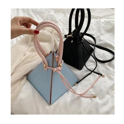 China Fashion Personality Women Drawstring Triangle Fashion New Pyramid Shaped Crossbody Portable Bag Designer Bag PU Trim Leather Handbag Clutches for sale