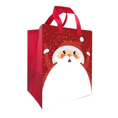 China Customized Eco-friendly Non-woven Christmas Non-woven Fabric Gift Tote Bag With Logo for sale