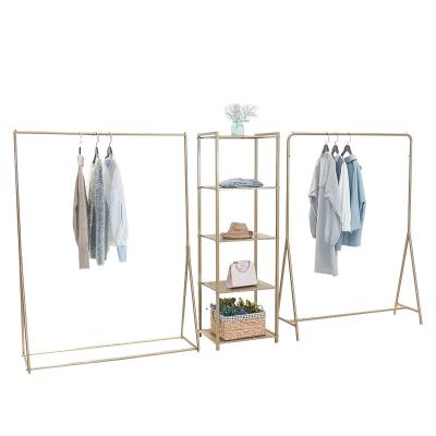 China Latest Fashion Show Design Rounded Corner Heavy Duty Clothing Display Stand Metal Wall Hanging Hanger Display for sale