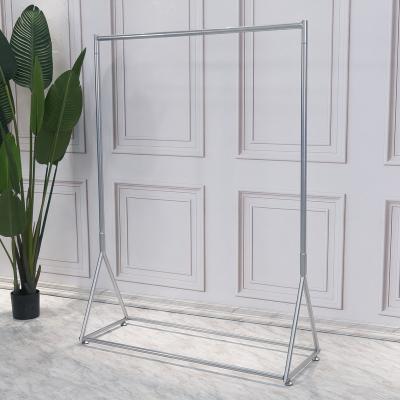 China Fashion Show Factory Outlet Clothes Flat Display Rack Silver Right Angle Floor Clothes Display Stand for sale