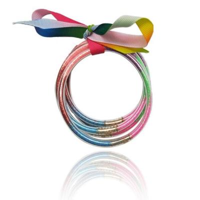 China Wholesale Glitter Jelly Bangle Bowknot Silicone Christmas Bracelets Glitter Jelly Friendship Bangle For Girls Filled for sale