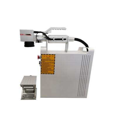 China Stable Fiber Laser Marking Machine Hand Held Type. 20W-100W adjustable. Raycus laser engraving machine. for sale