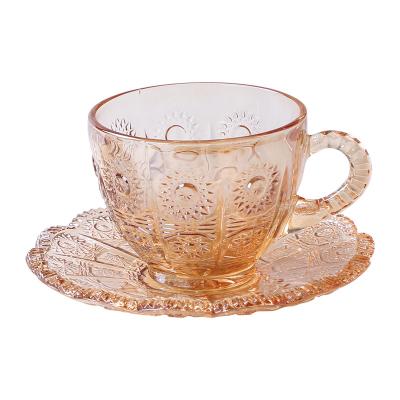 China Disposable Ins retro style sunflower coffee cup and saucer set household water cup afternoon camellia cup and glass saucer for sale