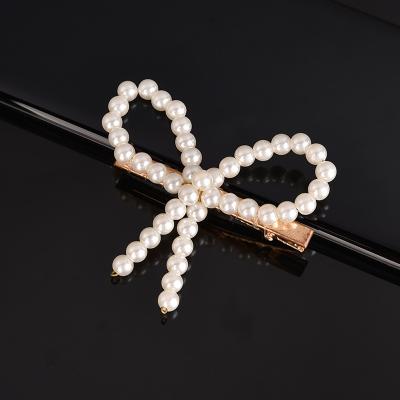 China Fast Delivery Trendy Fashion Hair Claw Clips For Women Korean Metal Hairpins Pearl Gold Hair Clip for sale